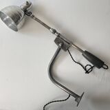 Old industrial wall light with counterweight.