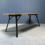 Handmade industrial oak dining table with black metal legs