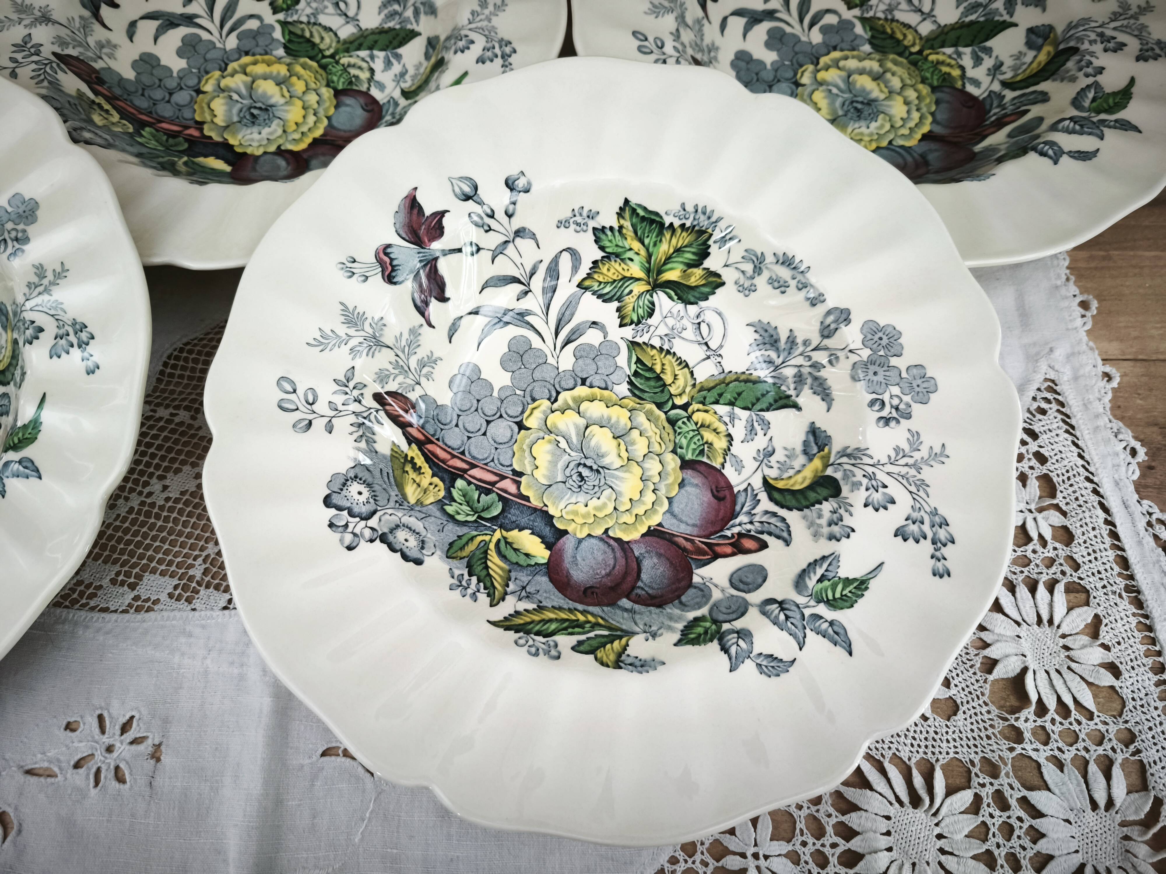 Set of 5 Royal Doulton deep plates in the Kirkwood pattern.