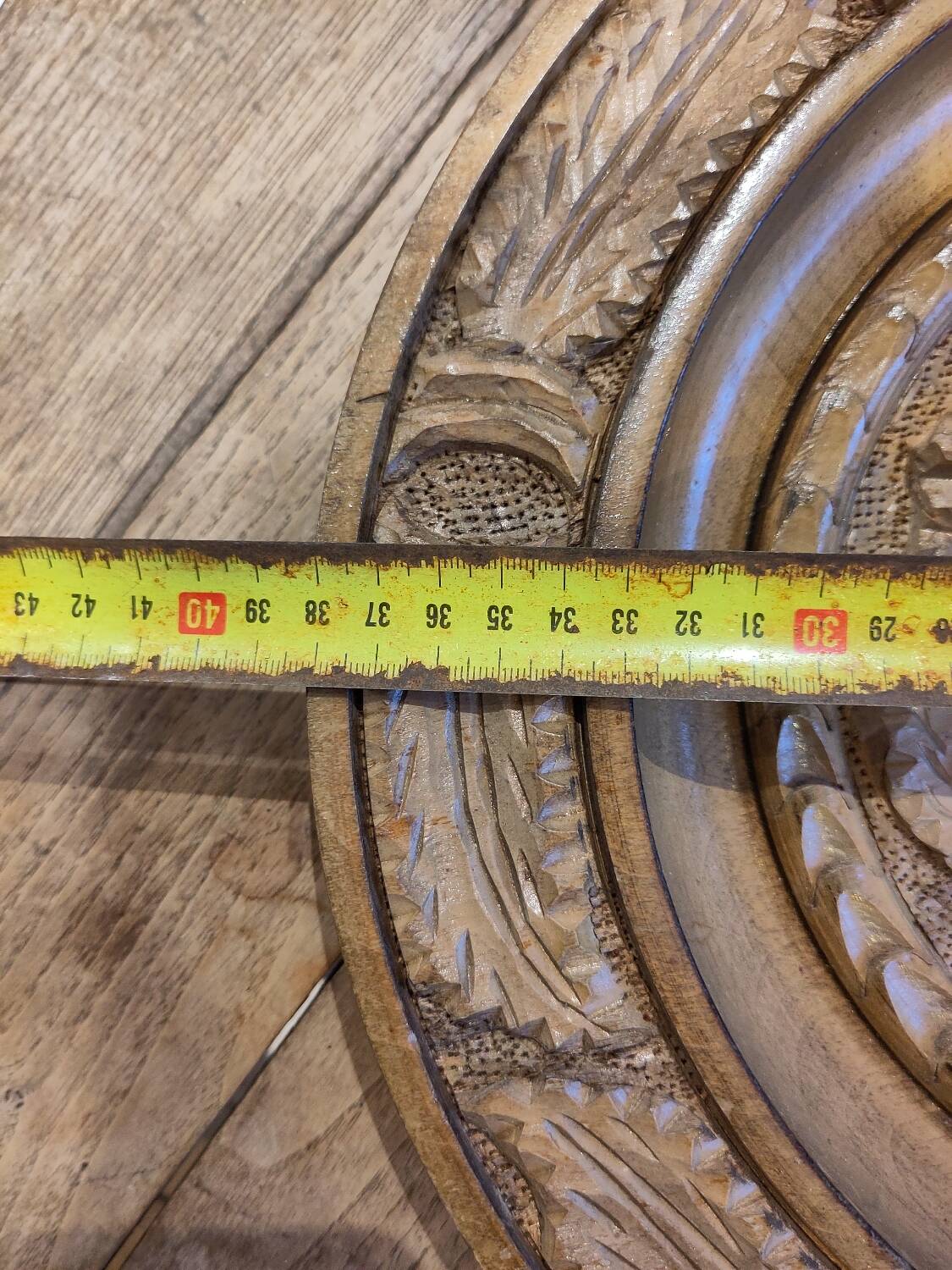 Round carved wooden dish