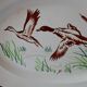 Digoin Sarreguemines dish, hand-painted decoration of wild birds