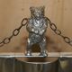 Art Deco fire screen from around 1920 in polished chrome with a bear.