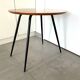 1970s coffee table in honey beech with black steel legs.