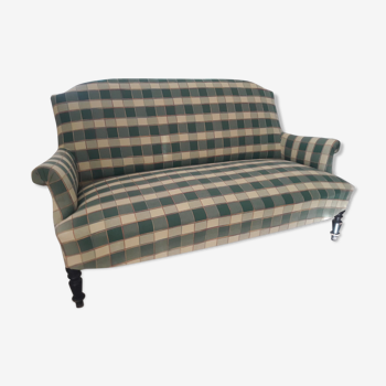 Fully retaped green checkered sofa