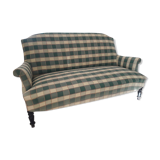 Fully retaped green checkered sofa