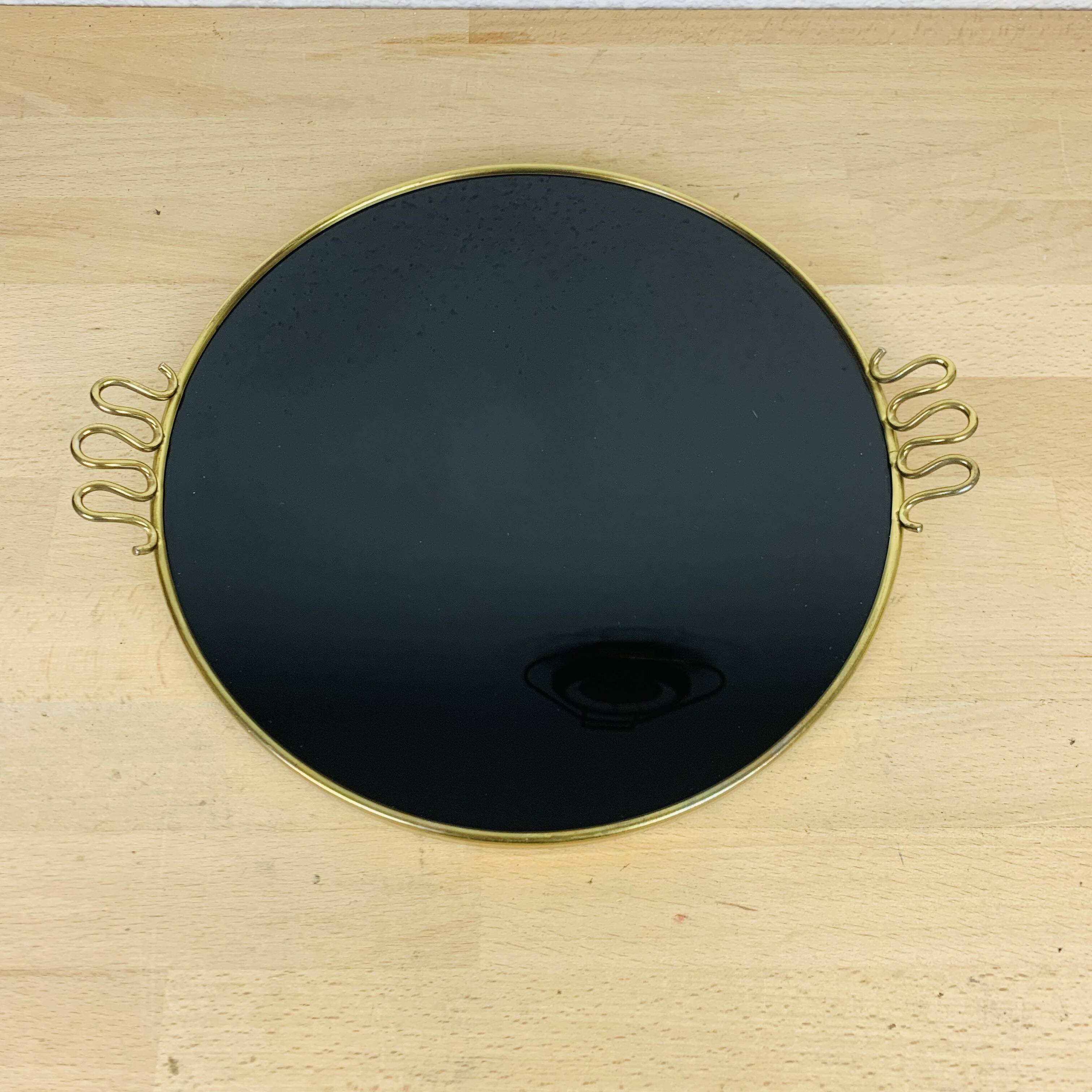 Black and golden brass tray from the 1950s