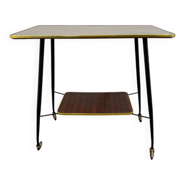 Vintage side table, brass gallery and wheels, 1950s.