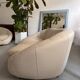 Rounded off-white leather sofa