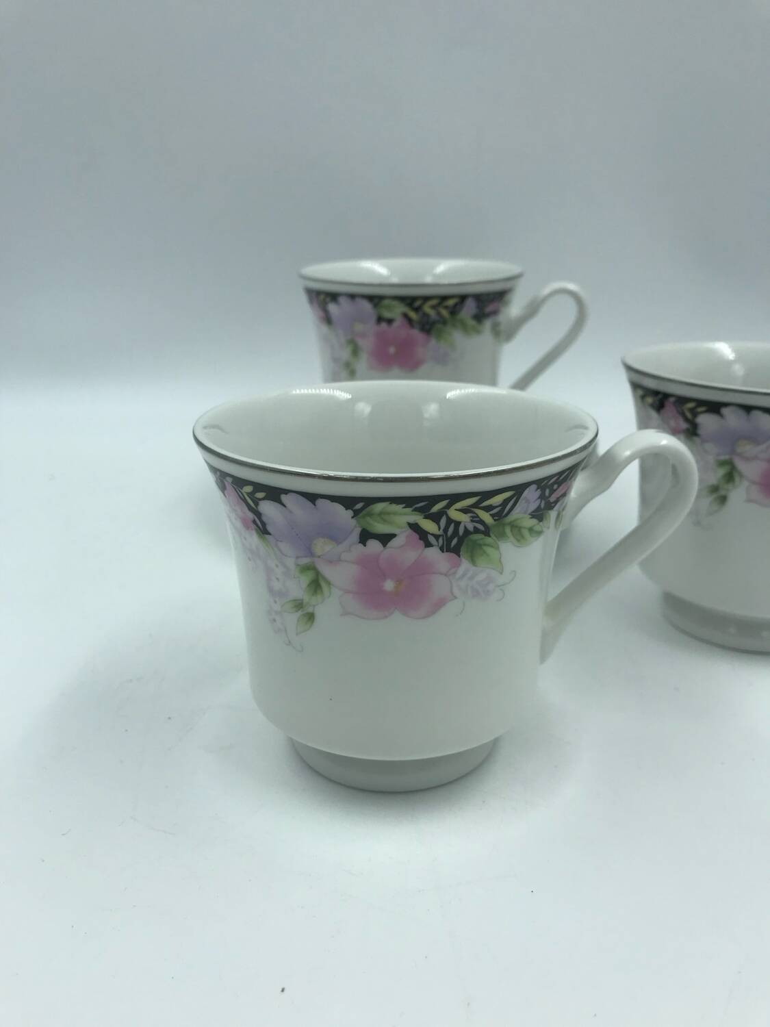 3 large cups and saucers
