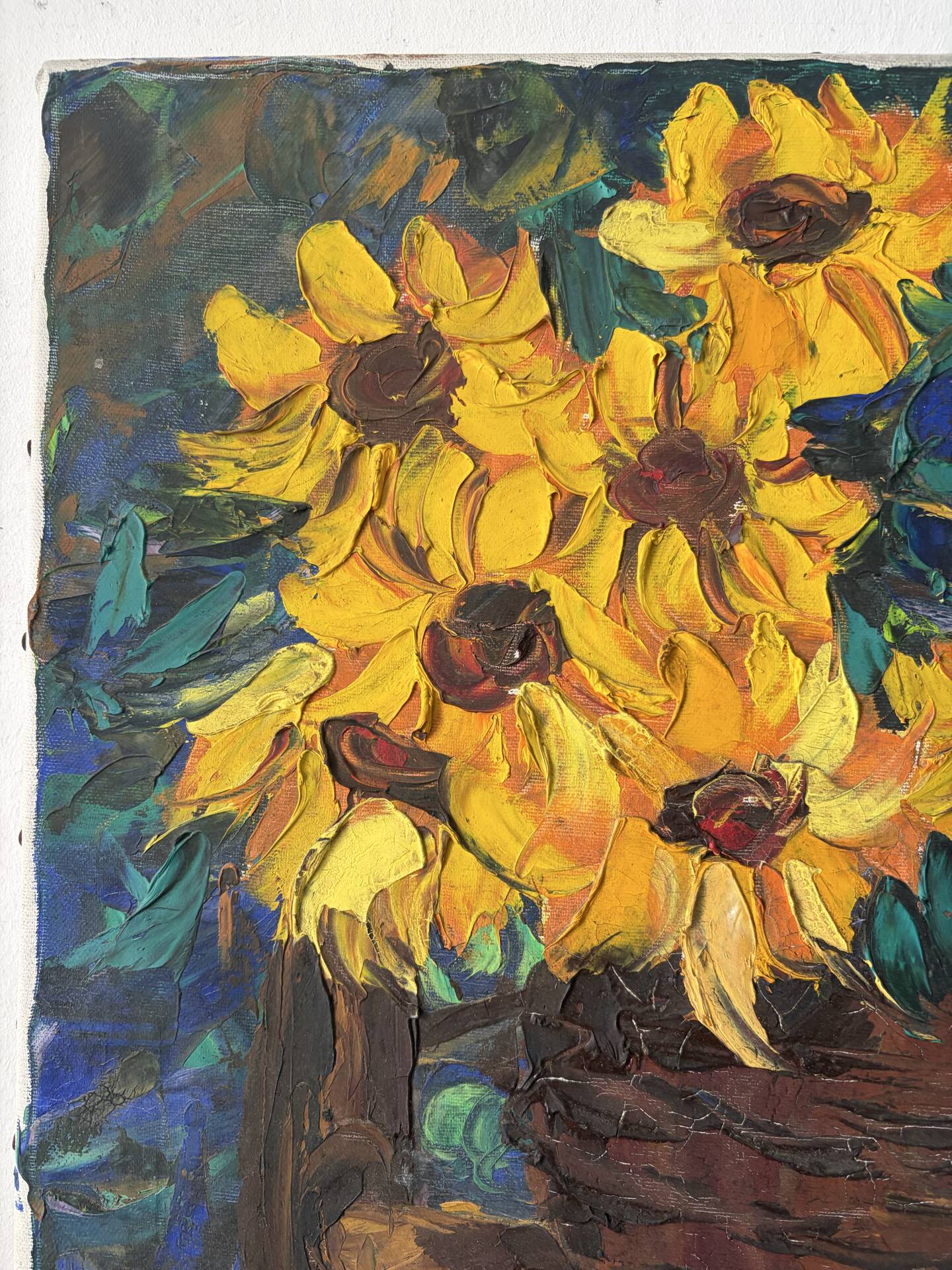Basket of sunflowers, knife oil
