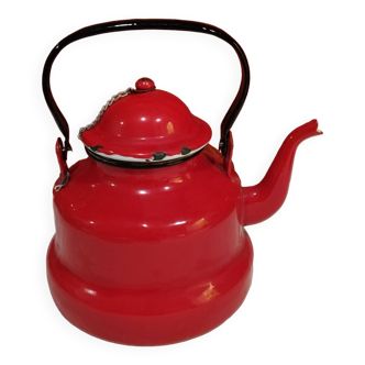 red enamelled sheet metal kettle