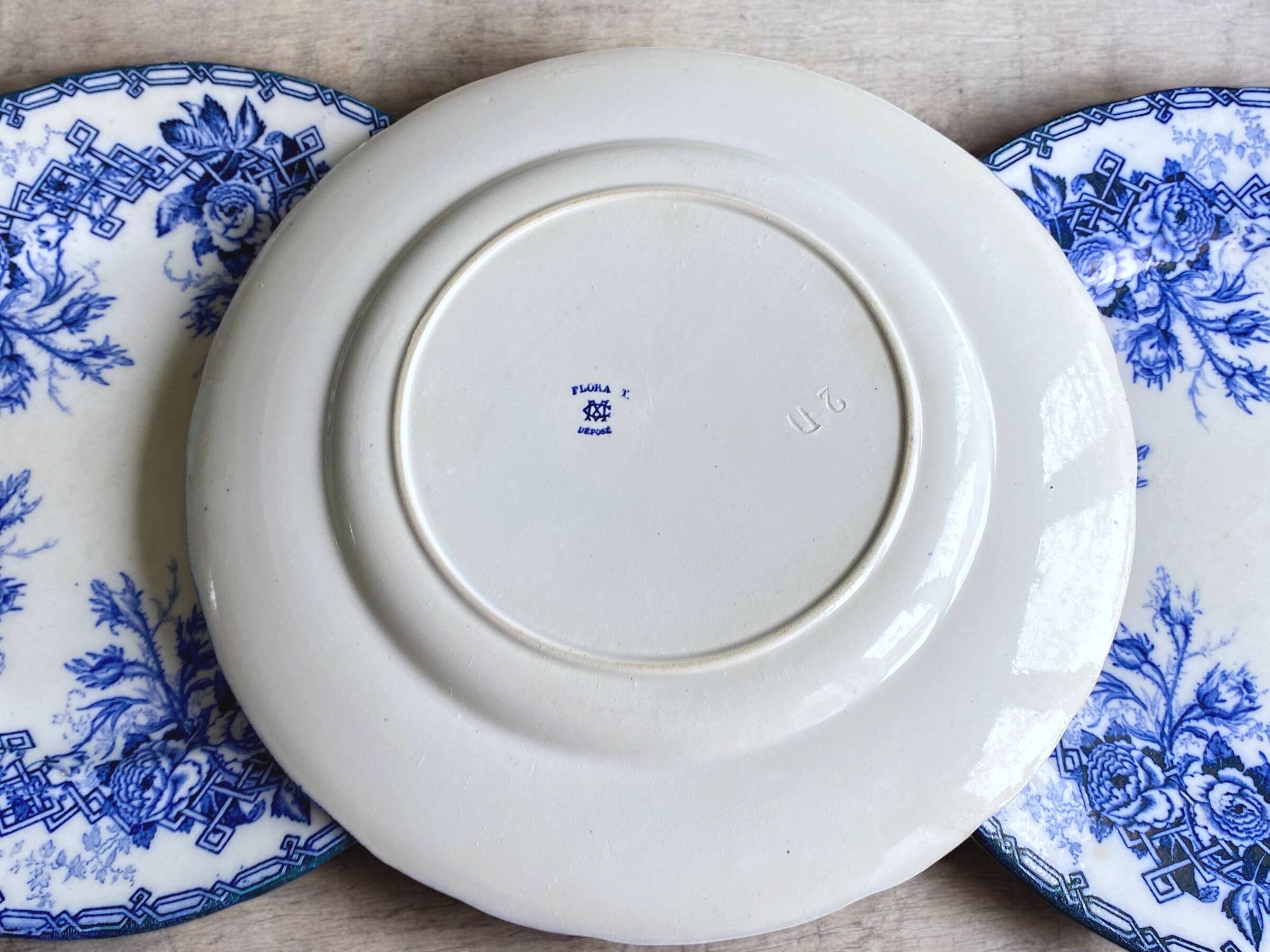 6 flat plates, Creil and Montereau earthenware, late 19th century, Flora decor