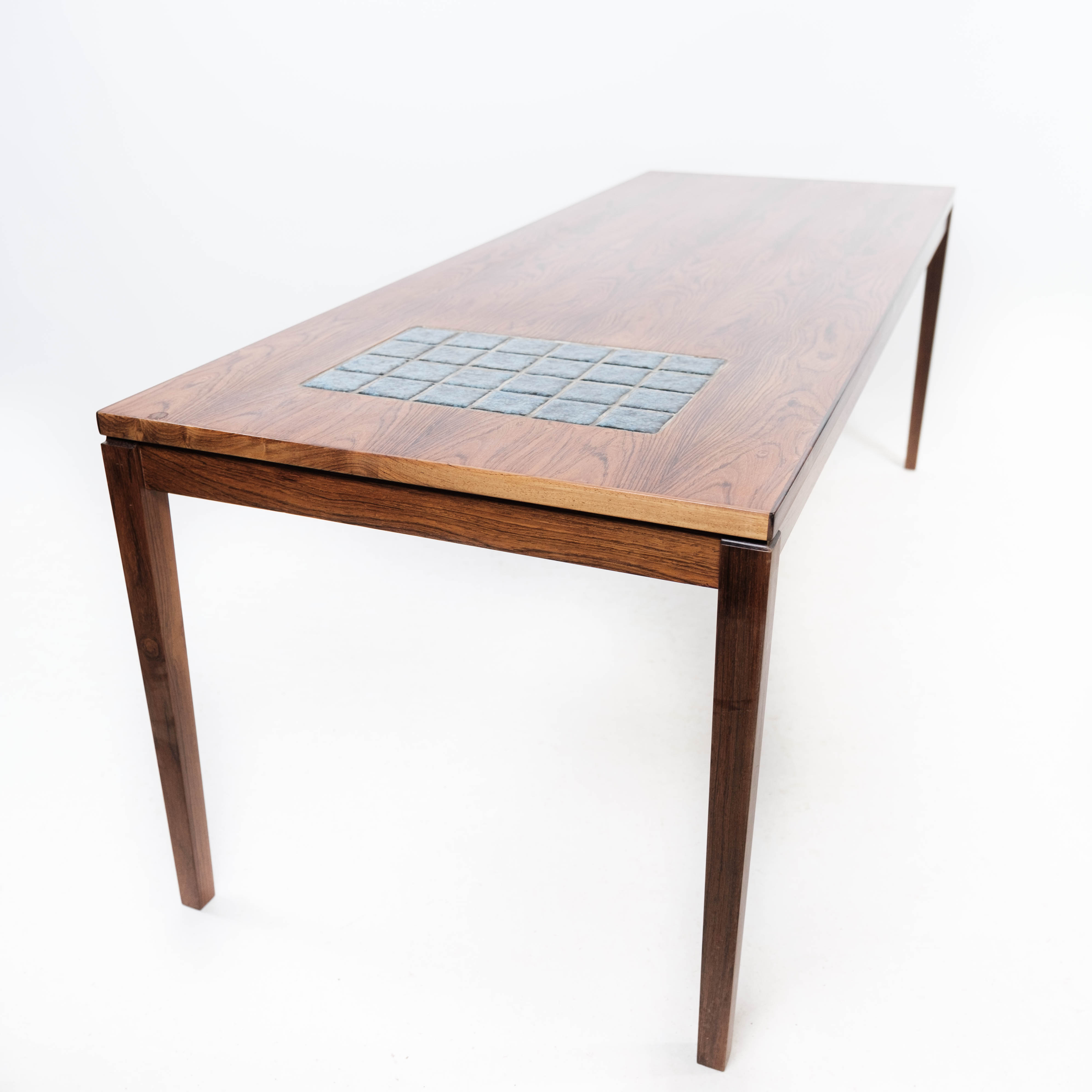 Coffee table in rosewood with blue tiles of Danish design from the 1960s