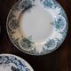A set of 4 flat plates Terre de fer mismatched blue