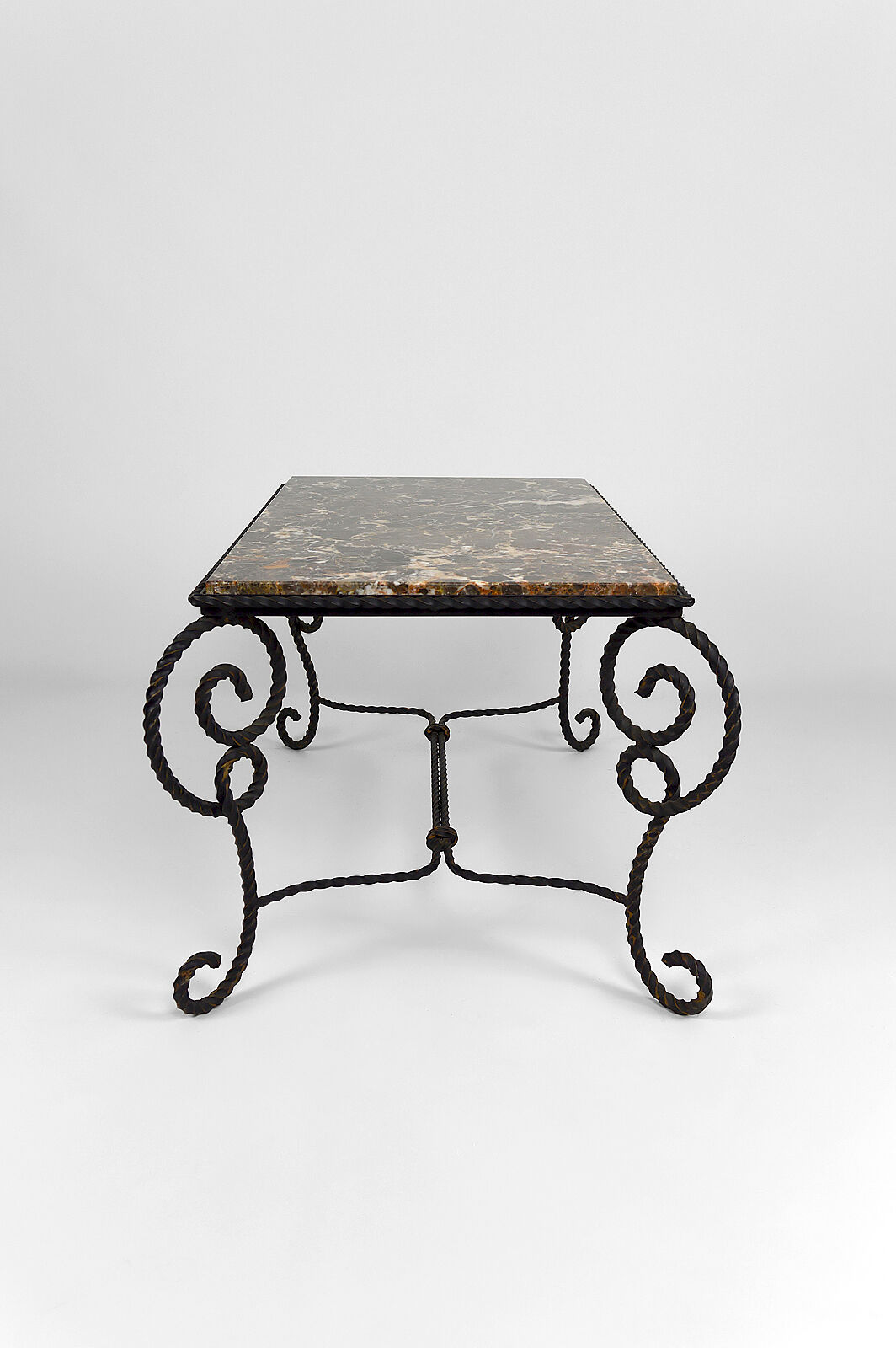 Coffee table in patinated wrought iron and marble, circa 1940