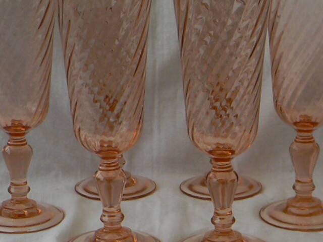 Set of 6 luminarc rosaline glass champagne flutes.
