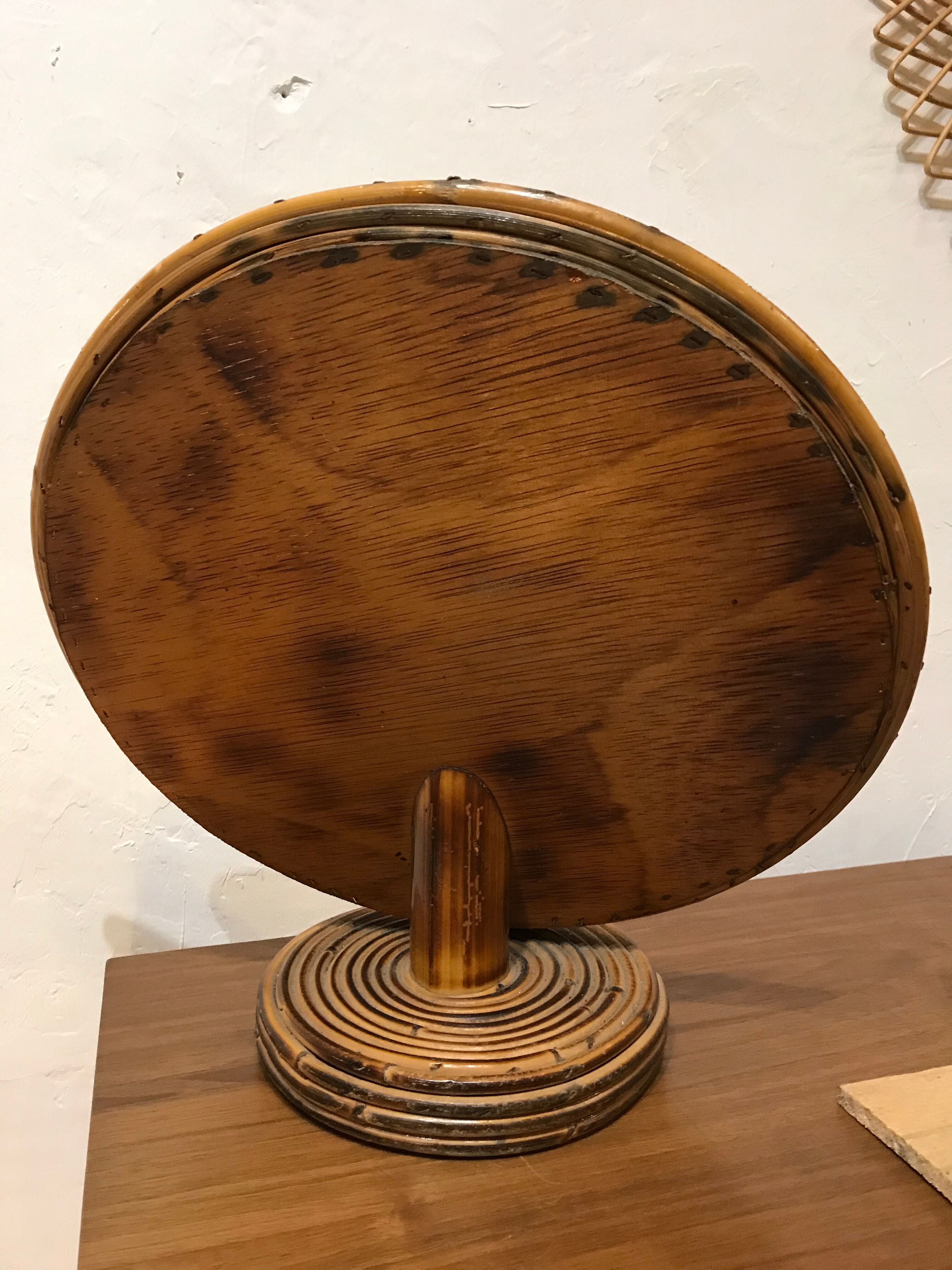 Round rattan mirror to lay
