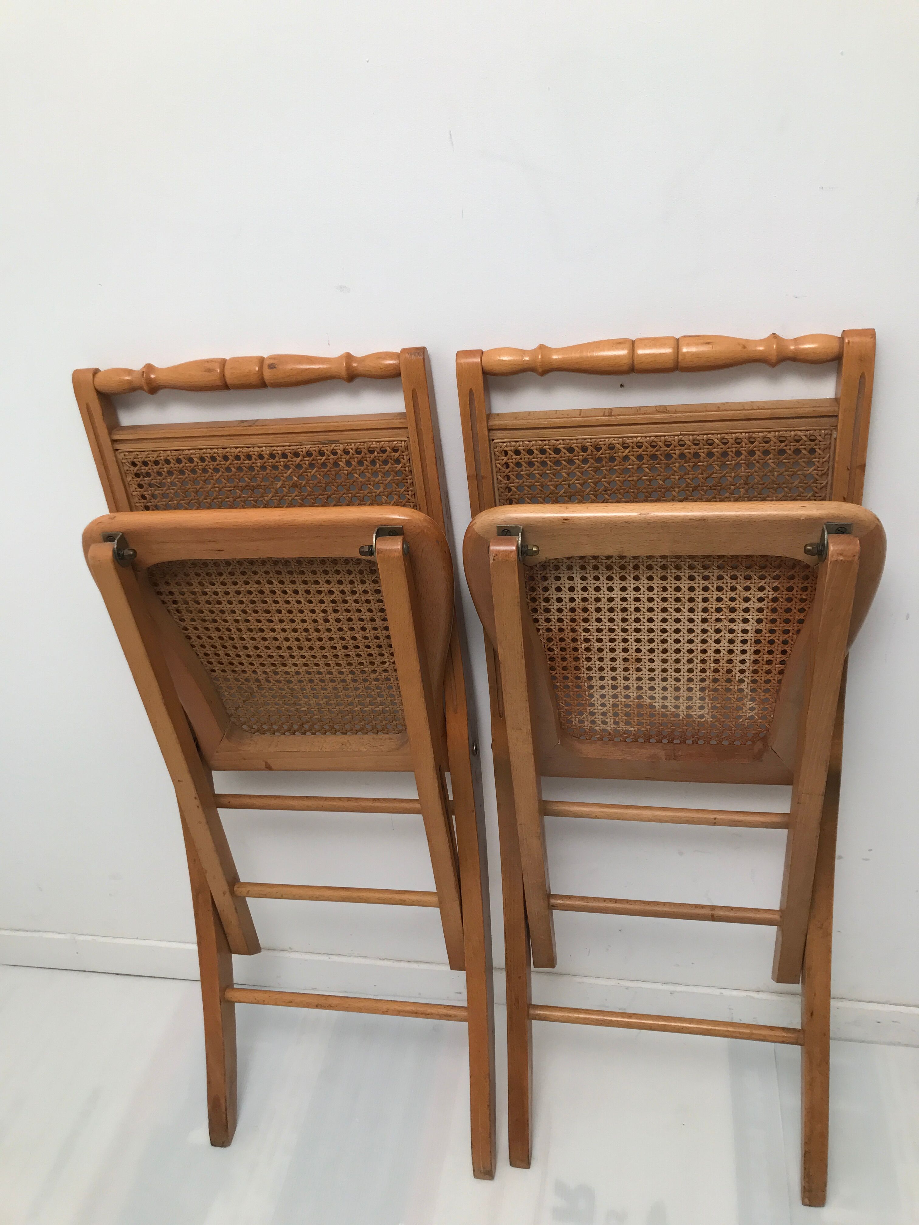 Pair vintage cannesy folding chairs