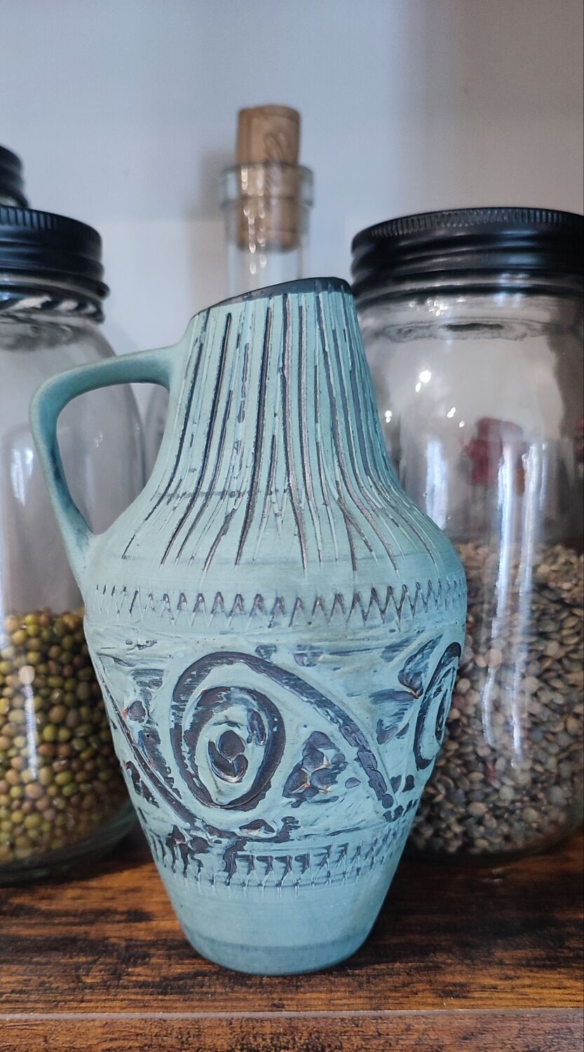 Vintage terracotta pitcher vase