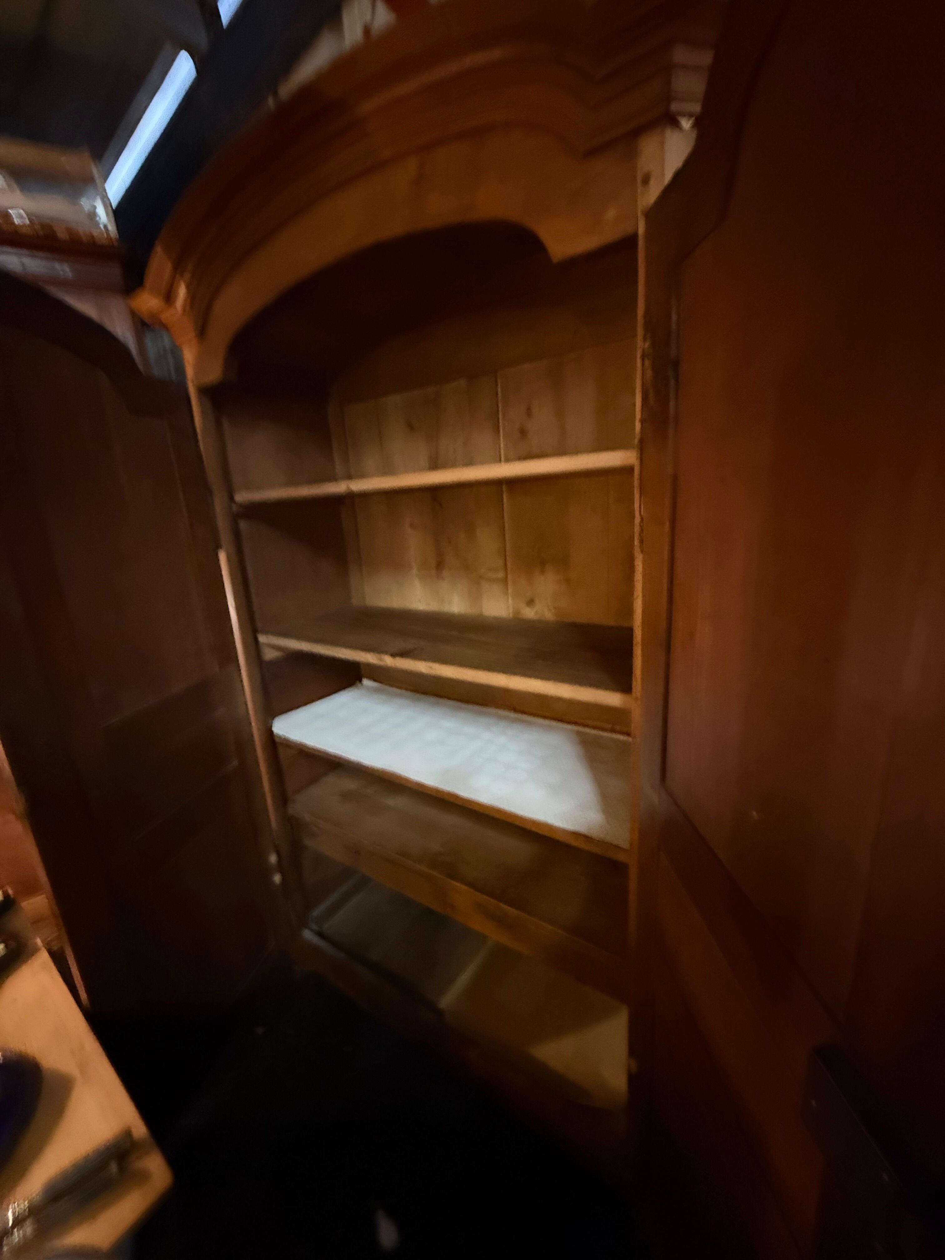 Louis XV wardrobe with a gendarme hat.