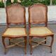 2 Louis XV style chairs in solid oak with rush seating from La Meublerie Meulin.
