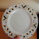 Round peedouche dish in Gien earthenware, birds and orange and black berries