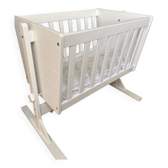 White wooden cradle