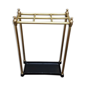 Umbrella door and nineteenth century canes in brass and cast iron