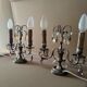 Pair of girandole lamps and silver metal