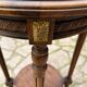 Old wooden pedestal table with marble top