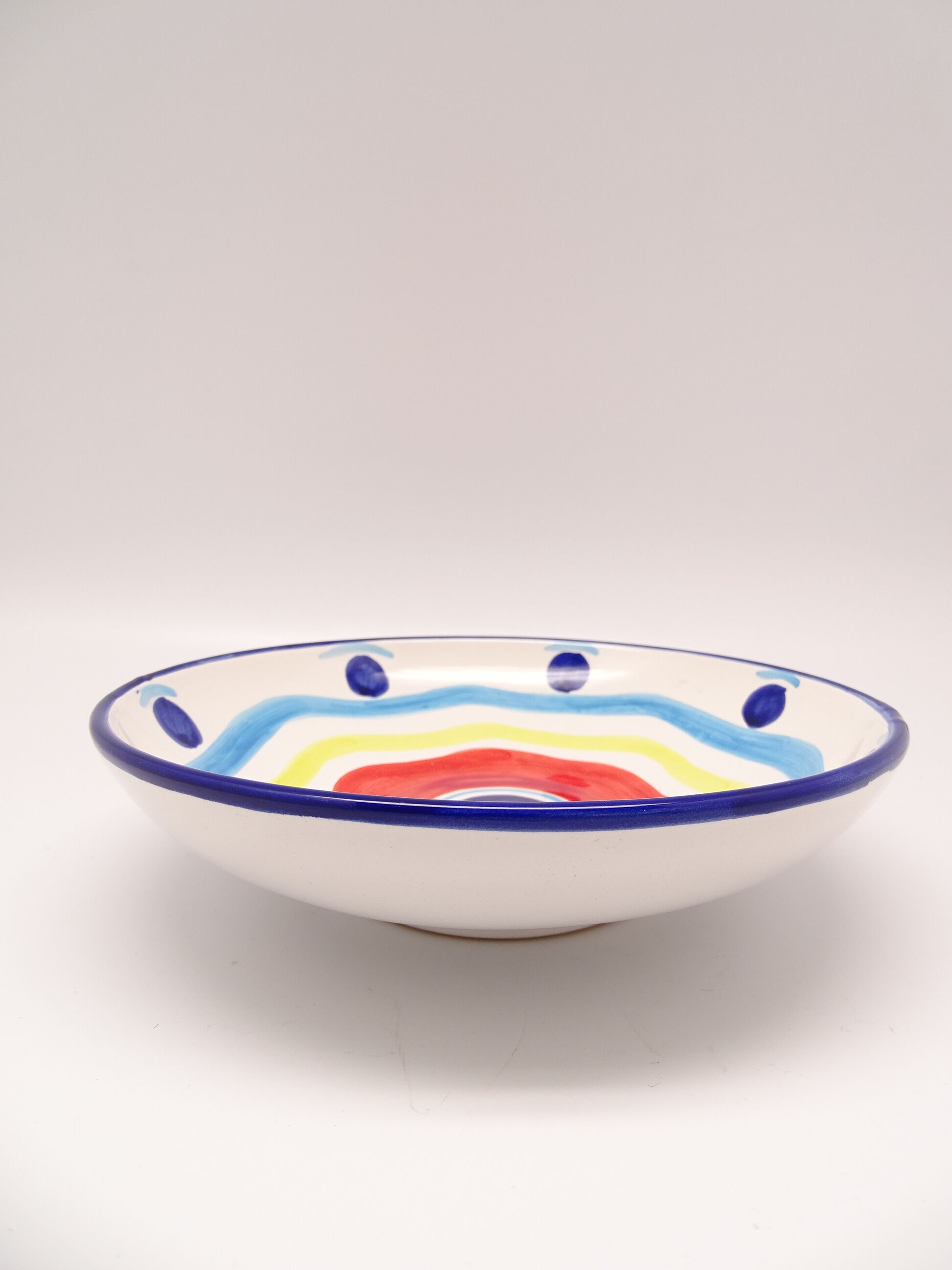 Multicolored hollow plate in Italian ceramic