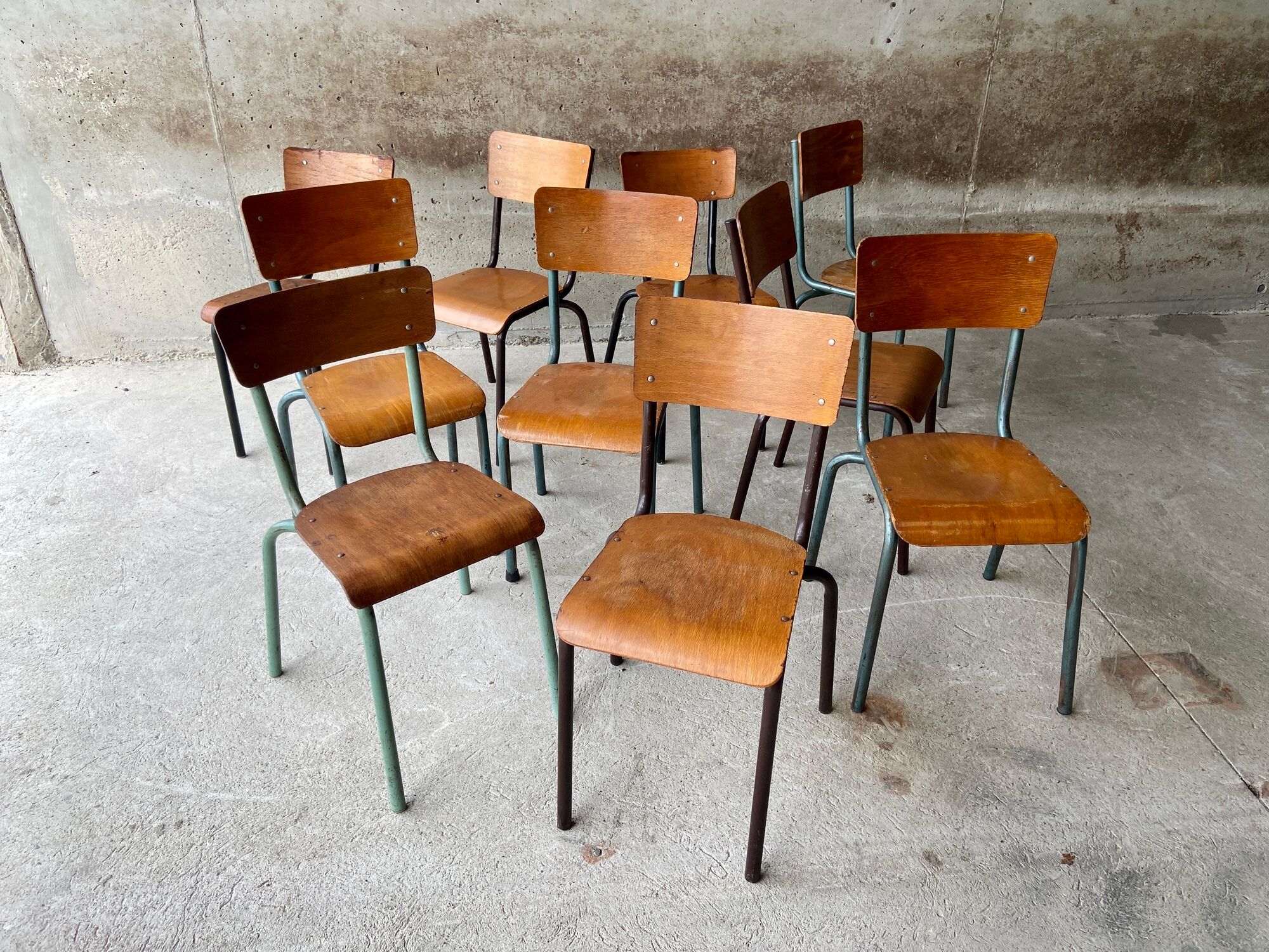 Set of 10 vintage mismatched industrial chairs mullca