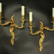 Pair of wall lamps stamped Louis XV style