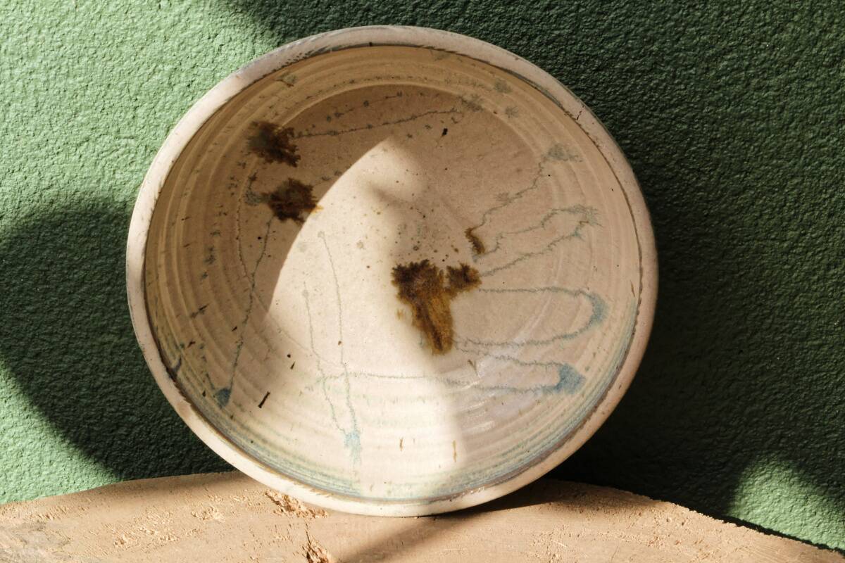 Hollow stoneware dish, signed Yves Loiselet