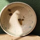 Hollow stoneware dish, signed Yves Loiselet