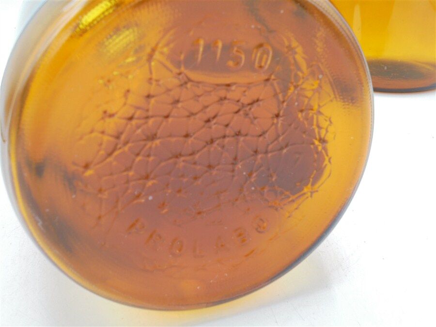 Trio of apothecary bottles