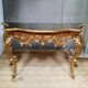 Console dorée style Louis XV