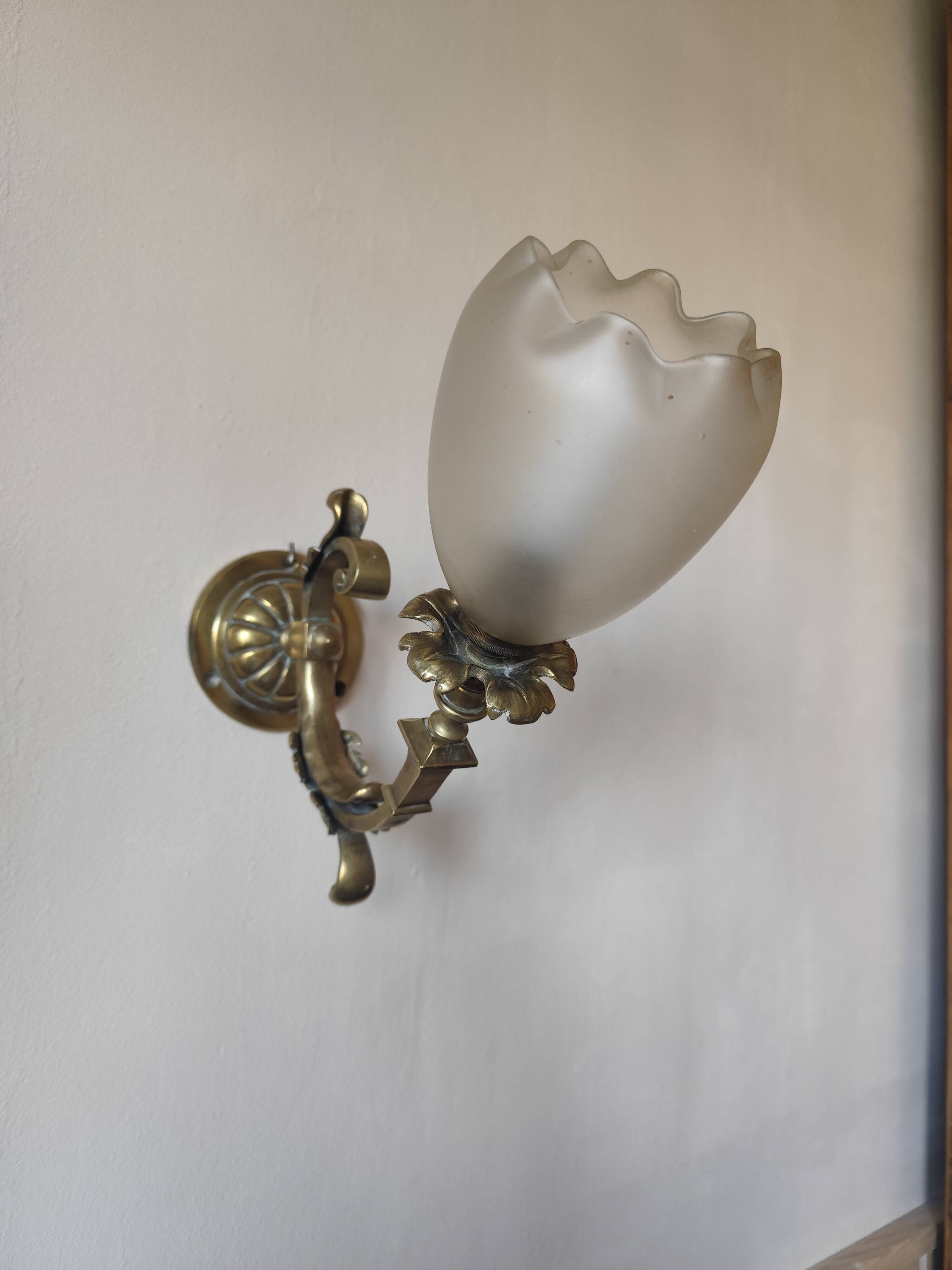 Bronze wall light with opaque glass tulip 1900