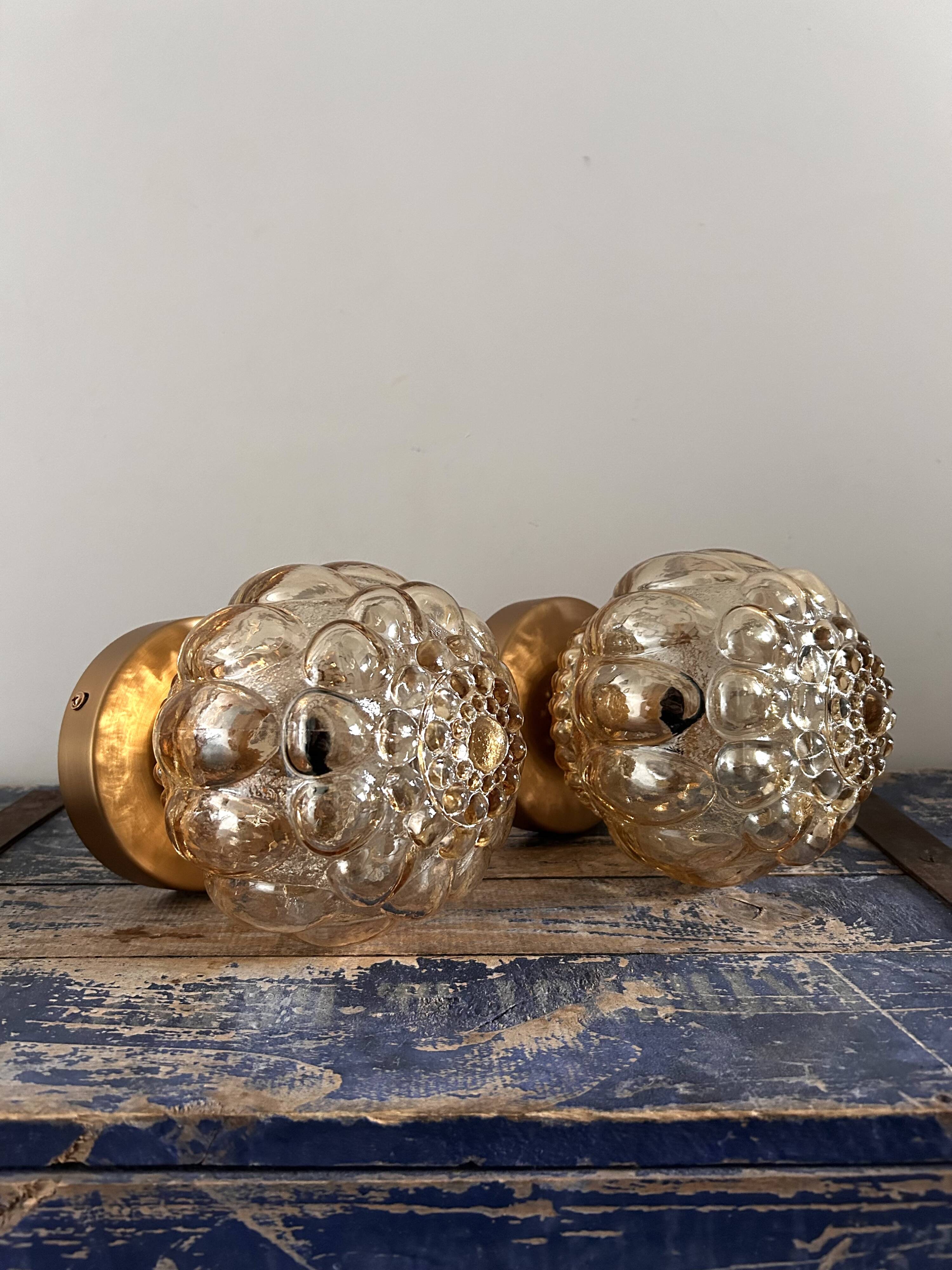 Pair of Scandinavian golden globe wall lights