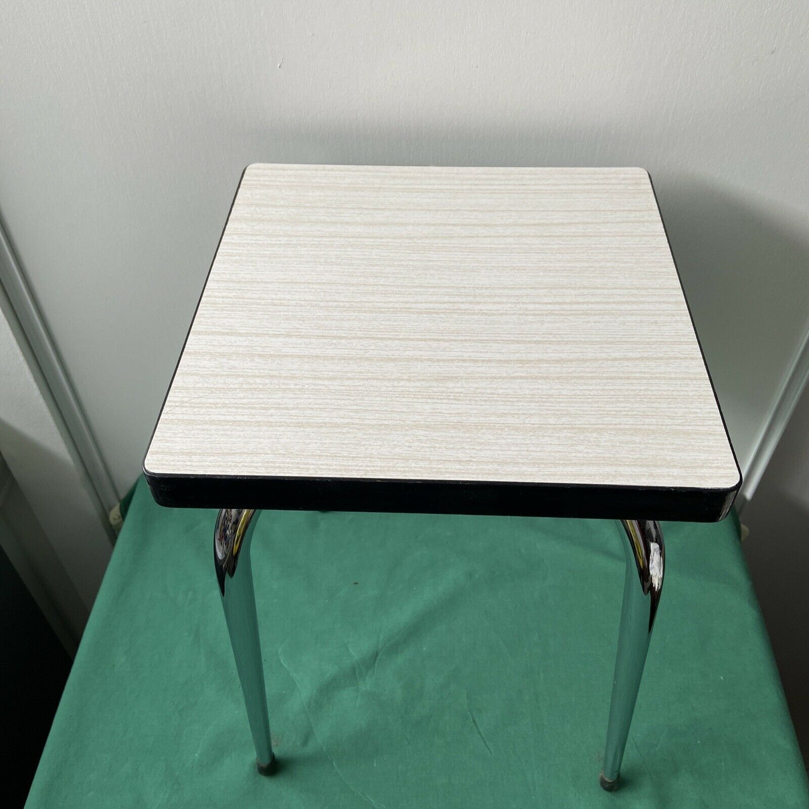 White stool in formica and metal