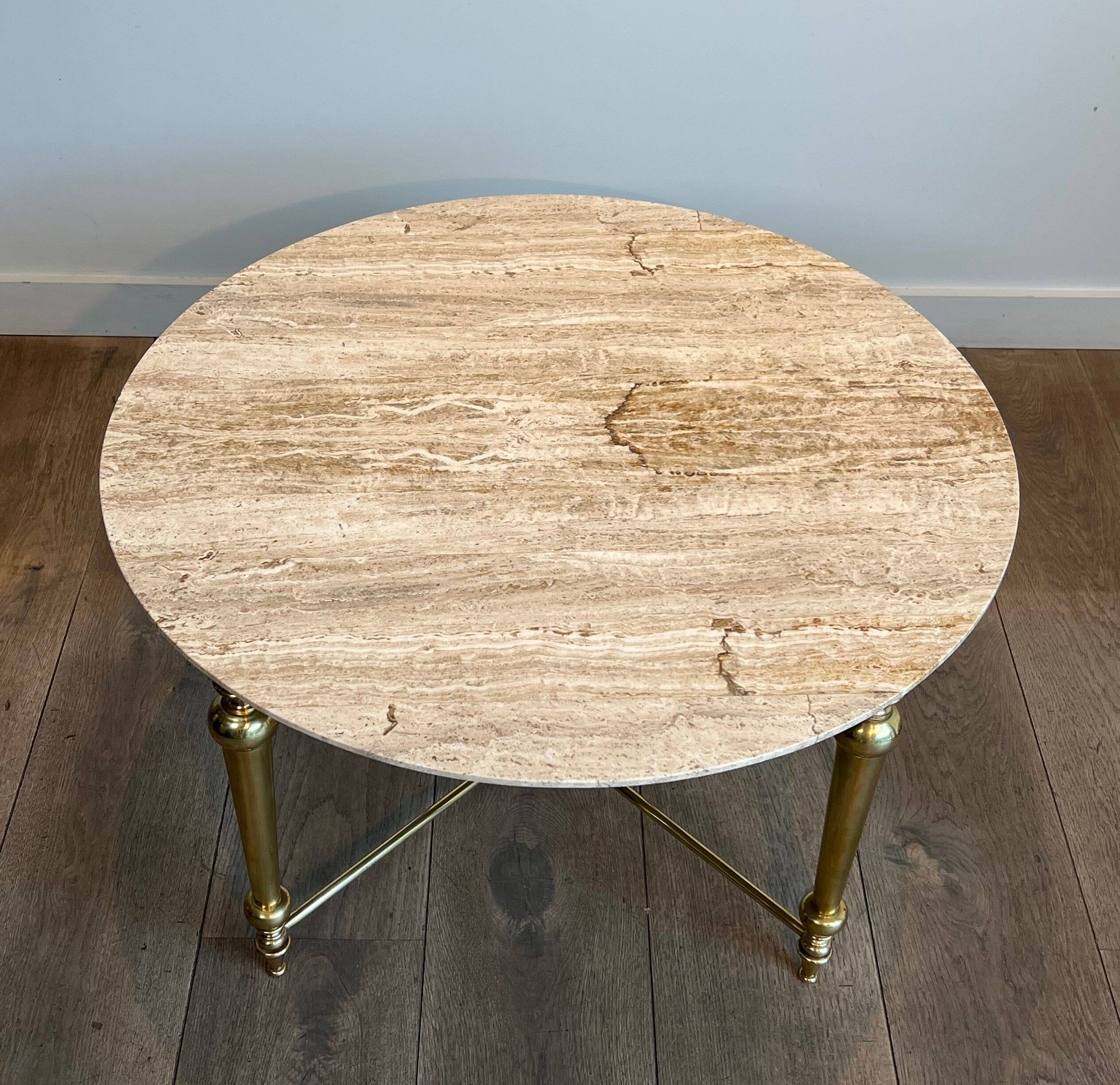 Brass coffee table with a white marble top.