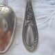 8 teaspoons made of silver metal
