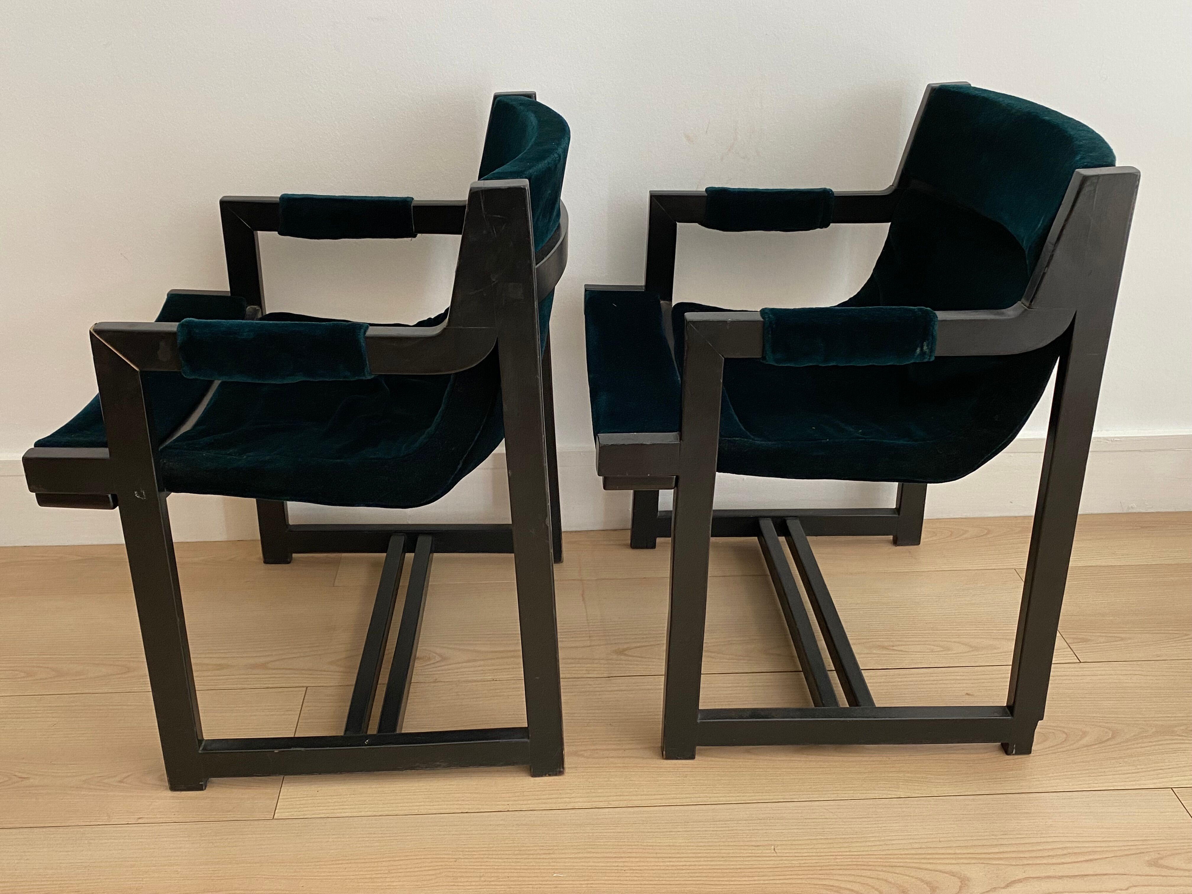 Vintage armchair in green velvet and black wood