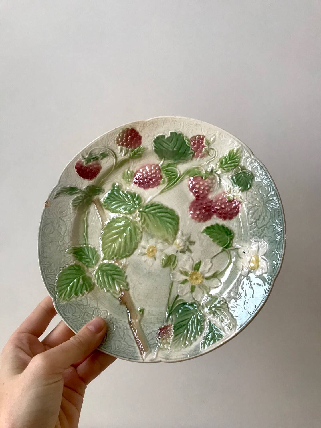 Trio of St Clement dessert plates in 19th century slip