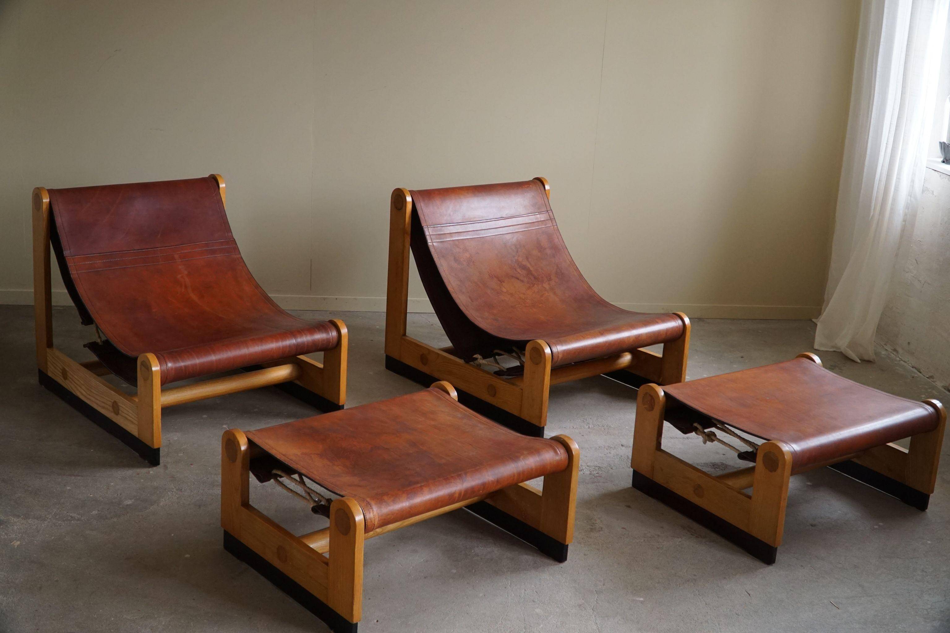 Francesco Lucianetti, Lounge chairs in leather and elm, Italian modern, 1960s