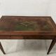 Louis XVI style desk in mahogany and veneer, 20th century.