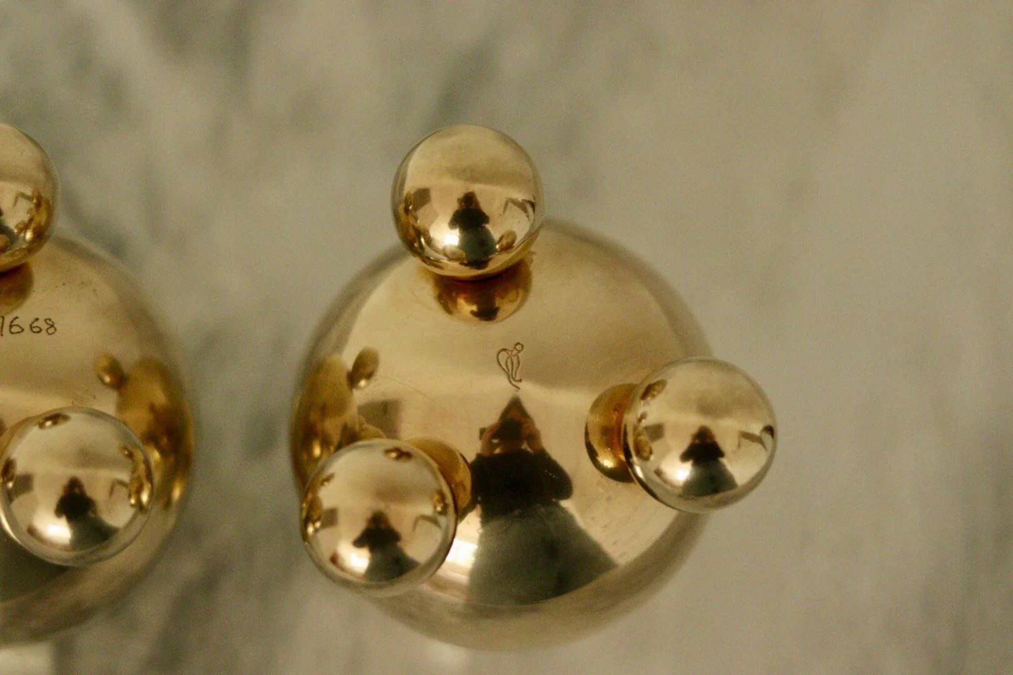 Pair of mid-century Swedish brass candle holders