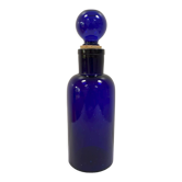 Old apothecary bottle in cobalt blue glass