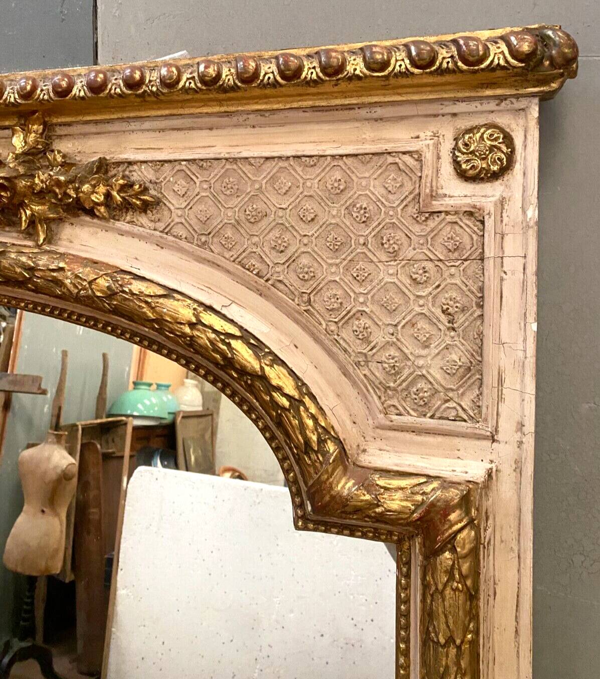 Louis XV style mirror in wood and gilded and patinated stucco 19th century