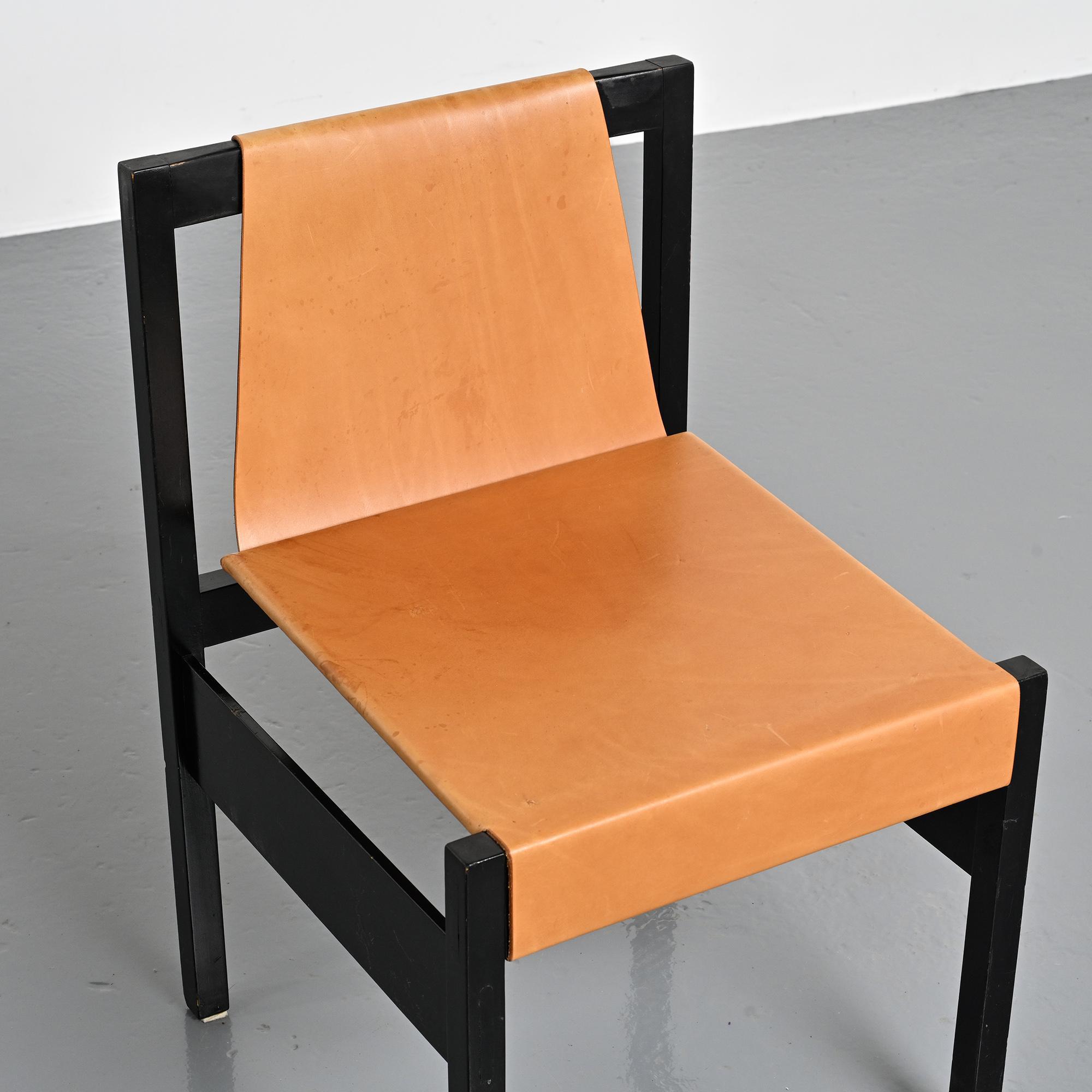 Set of black lacquered wooden chairs with leather, Swiss architect's work, 1980s.